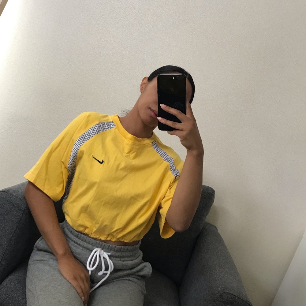 Yellow Nike drawstring crop tee